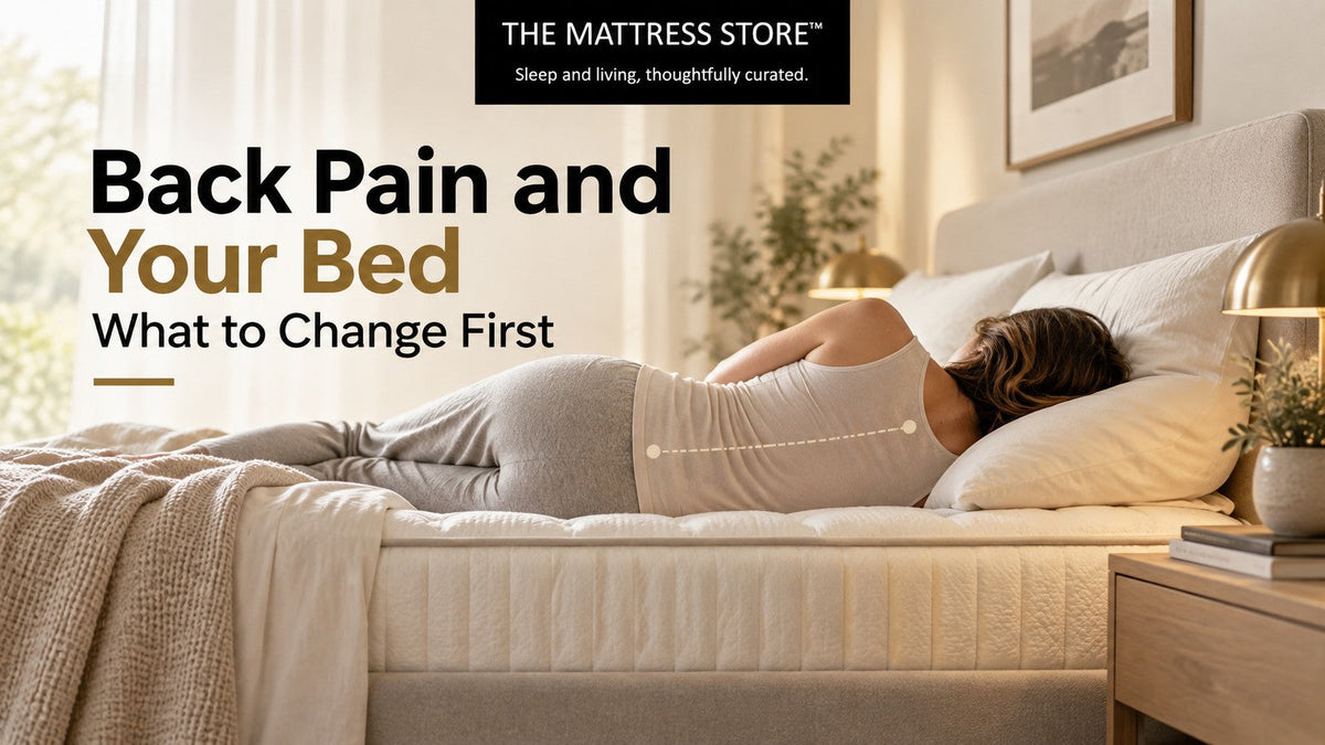 Person lying on their side on a mattress with the spine shown level from shoulder to hip.