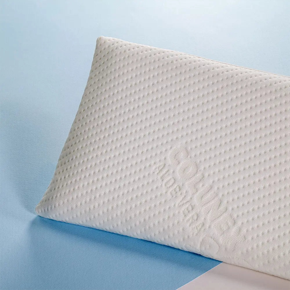 White textured pillow by Colunex on a light blue background