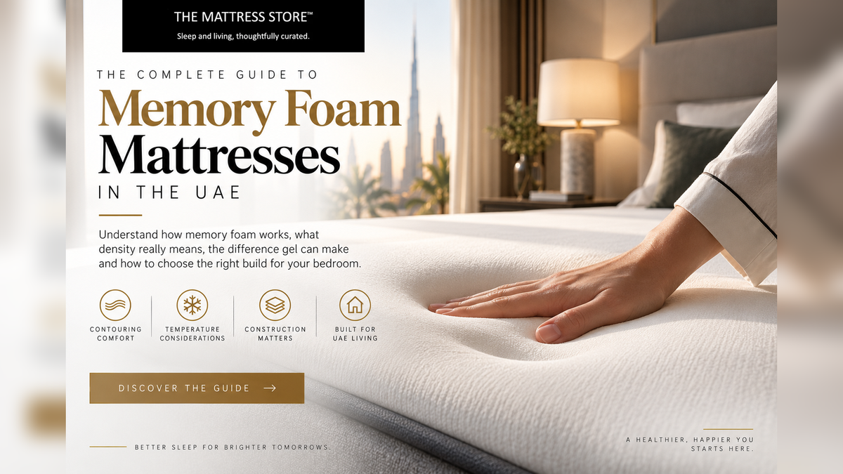 Hand pressing into a memory foam mattress showing the slow recovery of the impression