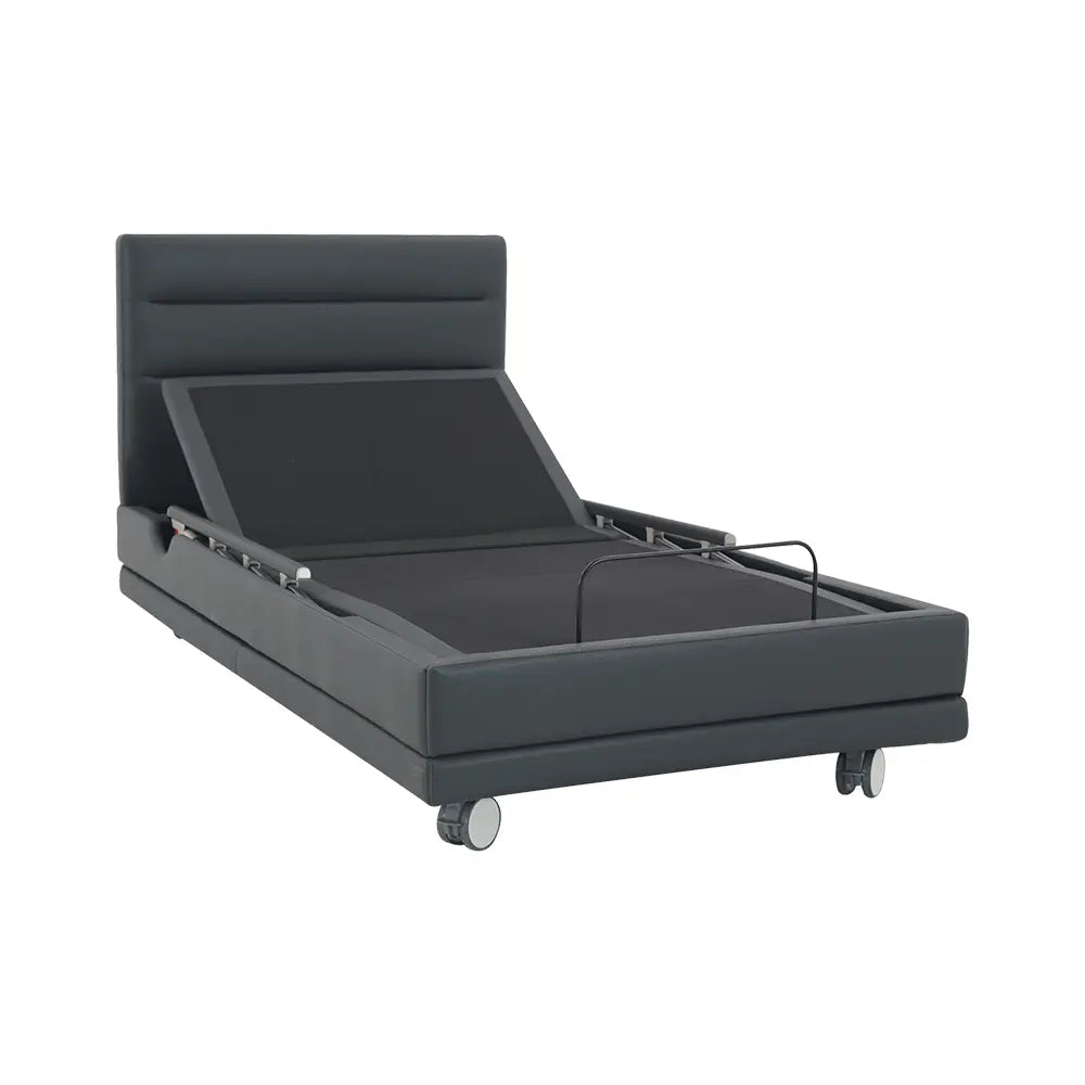 An adjustable bed with a black headboard and a flat, rectangular base on wheels, with a control panel on the side.