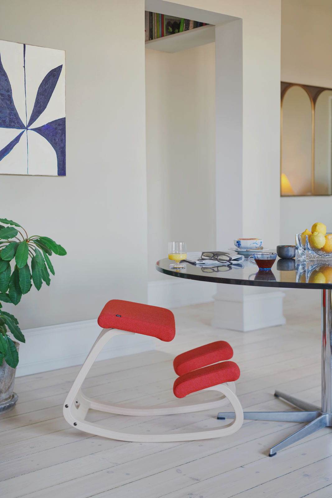 Variable Plus Chair by Varier in a Livingroom - Red - Home Usage